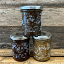 Load image into Gallery viewer, Three jars of Wildly Delicious confits on a wooden surface
