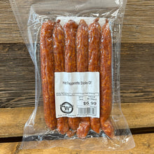 Load image into Gallery viewer, Packaged pepperettes on a wooden surface
