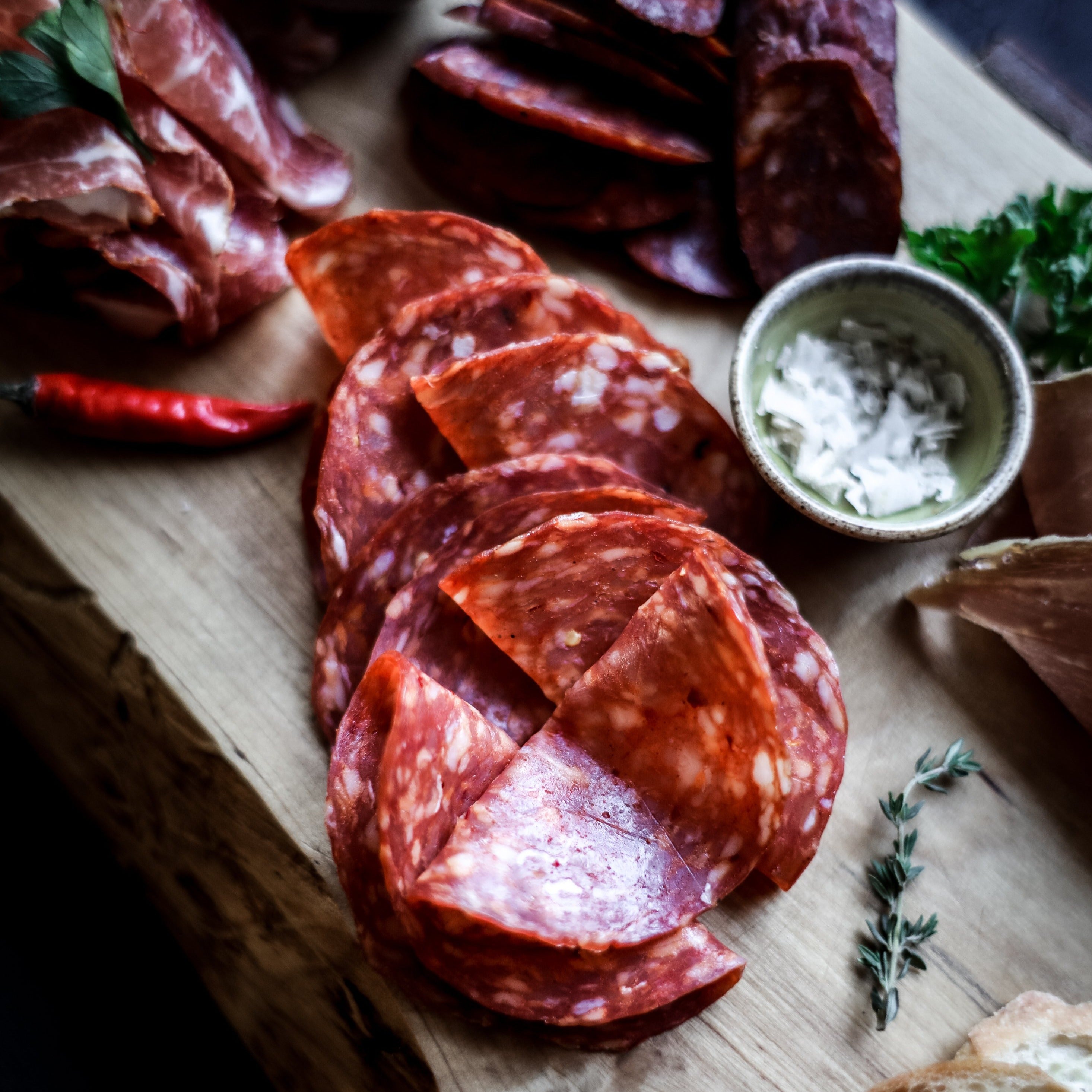 salami on a charcuterie board