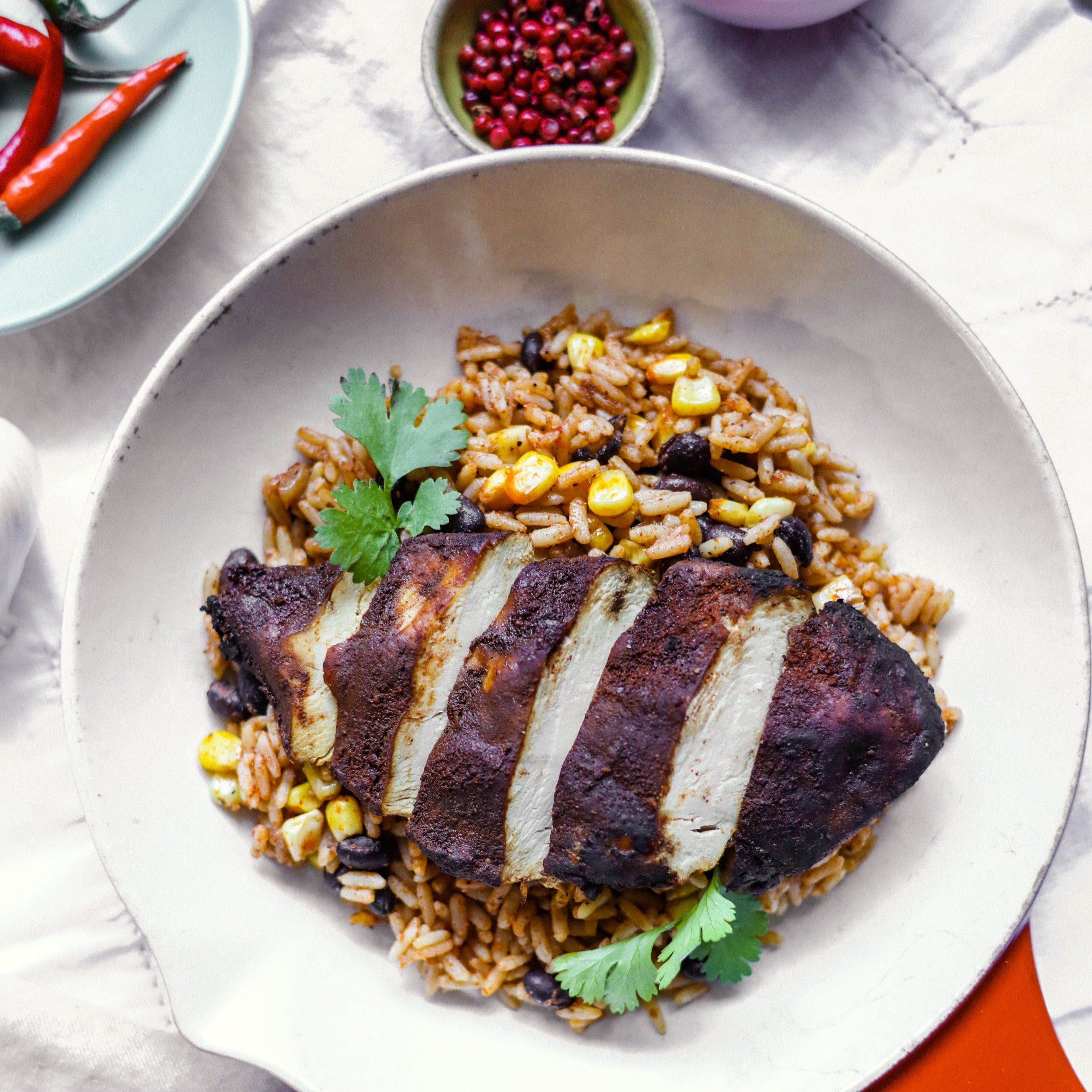 blackened chicken breast on Cajun rice